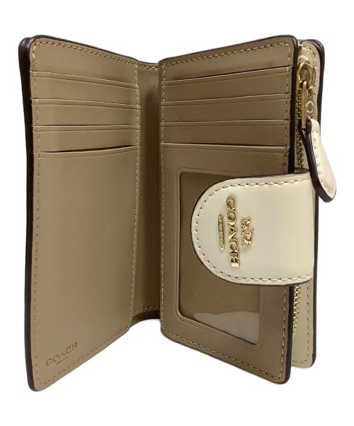 COACH（コーチ）COACH (コーチ) 2つ折り財布 ベージュの古着・服飾アイテム