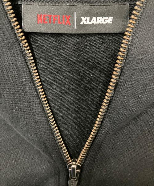 X-LARGE（エクストララージ）X-LARGE (エクストララージ) NETFLIX (ネットフリックス) ジップパーカー ブラック サイズ:Mの古着・服飾アイテム