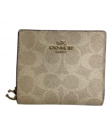 COACH（コーチ）の古着「2つ折り財布」｜ベージュ