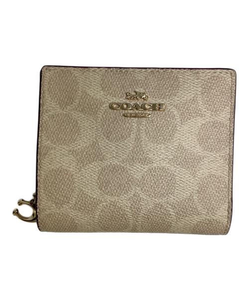 COACH（コーチ）COACH (コーチ) 2つ折り財布 ベージュの古着・服飾アイテム