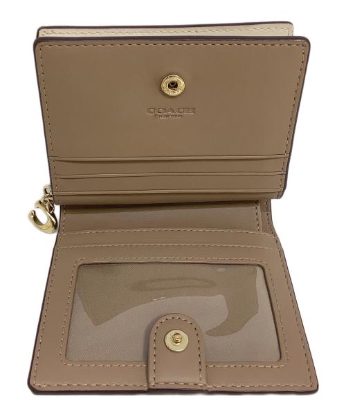 COACH（コーチ）COACH (コーチ) 2つ折り財布 ベージュの古着・服飾アイテム