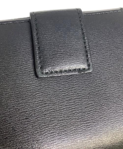 Ferragamo（フェラガモ）Ferragamo (フェラガモ) 2つ折り財布 ブラックの古着・服飾アイテム
