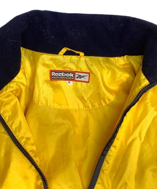 REEBOK（リーボック）REEBOK (リーボック) アノラックパーカー ネイビー×イエロー サイズ:Mの古着・服飾アイテム