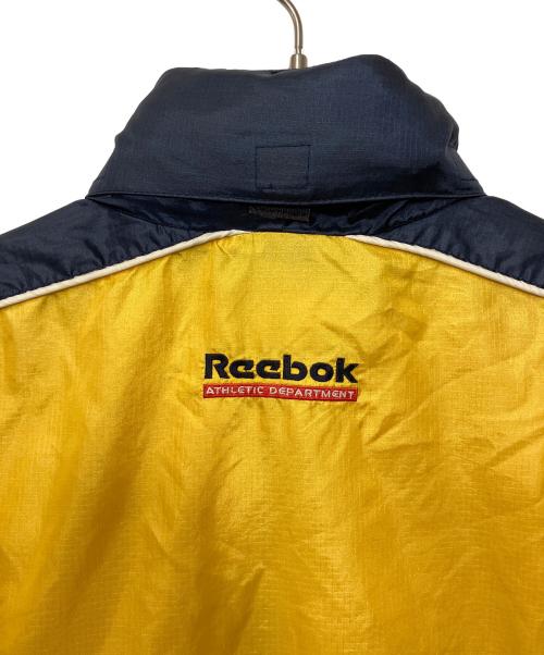 REEBOK（リーボック）REEBOK (リーボック) アノラックパーカー ネイビー×イエロー サイズ:Mの古着・服飾アイテム