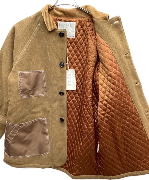 AOZORA BLUE HEAVEN（アオゾラブルーヘブン）AOZORA BLUE HEAVEN (アオゾラブルーヘブン) カバーオール ベージュ×ブラウン サイズ:4 未使用品の古着・服飾アイテム