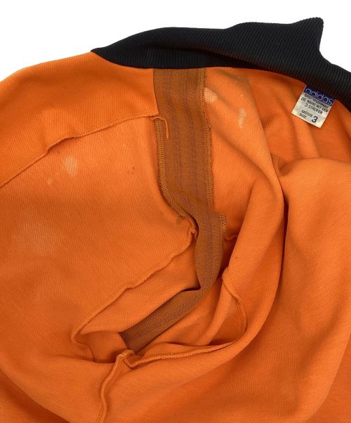 adidas（アディダス）adidas (アディダス) トラックジャケット オレンジ×ブラック サイズ:3の古着・服飾アイテム