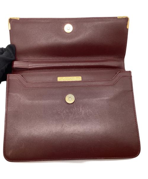 must de cartier（マストドゥカルティエ）must de cartier (マストドゥカルティエ) クラッチバッグ エンジの古着・服飾アイテム