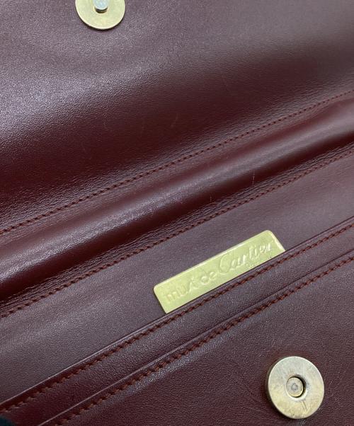 must de cartier（マストドゥカルティエ）must de cartier (マストドゥカルティエ) クラッチバッグ エンジの古着・服飾アイテム