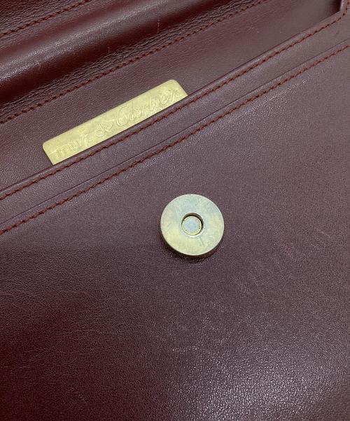 must de cartier（マストドゥカルティエ）must de cartier (マストドゥカルティエ) クラッチバッグ エンジの古着・服飾アイテム