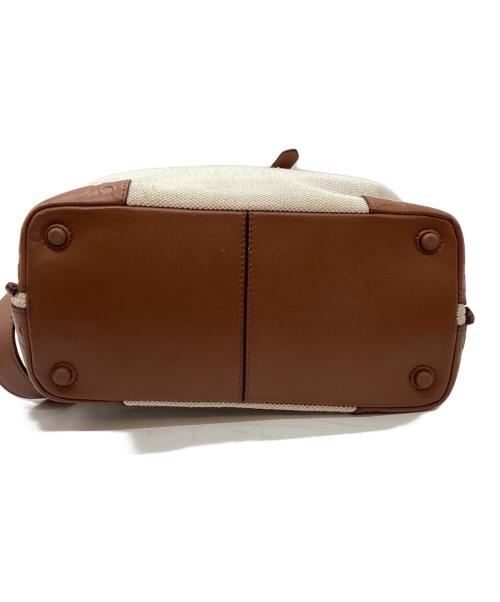 COLE HAAN（コールハーン）COLE HAAN (コールハーン) スモールキャンバスバケットバッグ ベージュ×ブラウンの古着・服飾アイテム