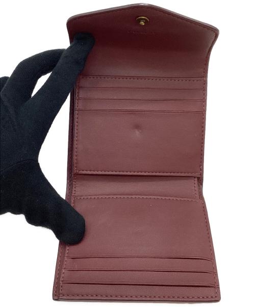 COACH（コーチ）COACH (コーチ) 3つ折り財布 ピンクの古着・服飾アイテム