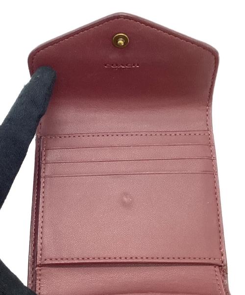 COACH（コーチ）COACH (コーチ) 3つ折り財布 ピンクの古着・服飾アイテム