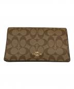 COACHコーチ）の古着「ショルダーバッグ/シグネチャー/アンナフォールド」｜ブラウン×ホワイト