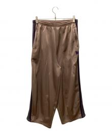 Needles（ニードルズ）の古着「トラックパンツ/ヒザデルトラックパンツ」｜ピンク×パープル