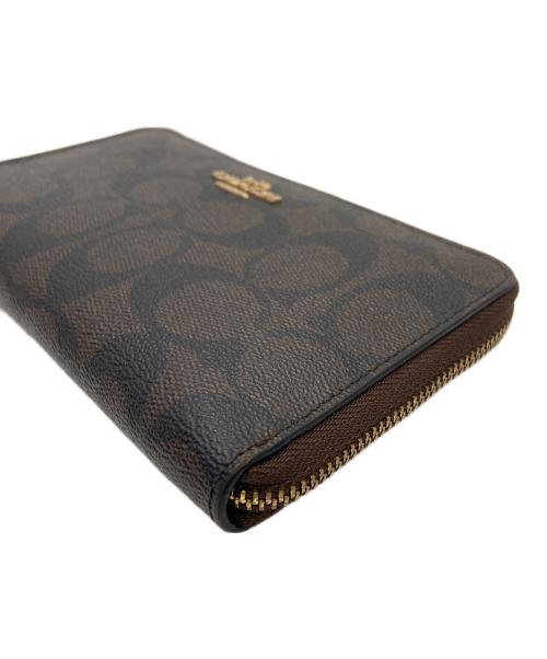 COACH（コーチ）COACH (コーチ) ラウンドファスナー財布 ブラウン×ブラックの古着・服飾アイテム