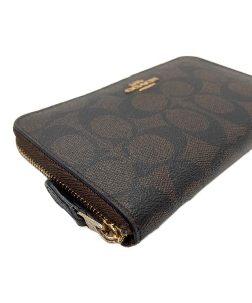 COACH（コーチ）COACH (コーチ) ラウンドファスナー財布 ブラウン×ブラックの古着・服飾アイテム