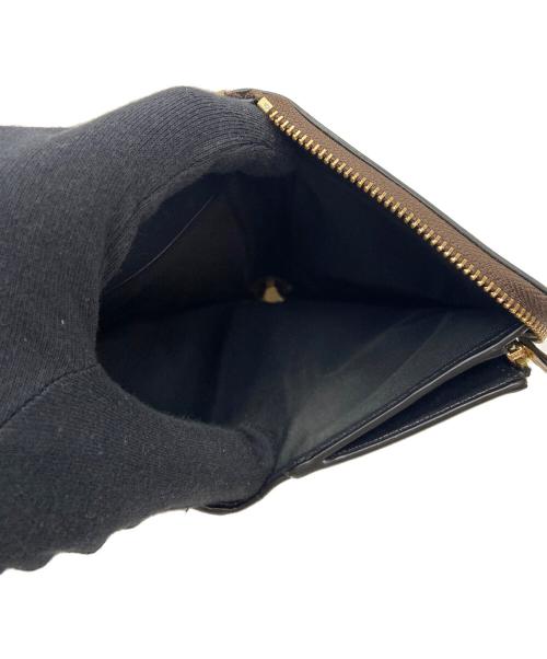 COACH（コーチ）COACH (コーチ) ラウンドファスナー財布 ブラウン×ブラックの古着・服飾アイテム