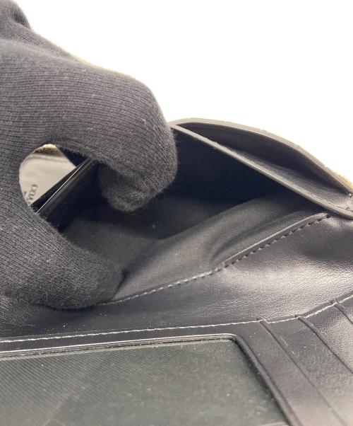 COACH（コーチ）COACH (コーチ) ラウンドファスナー財布 ブラウン×ブラックの古着・服飾アイテム