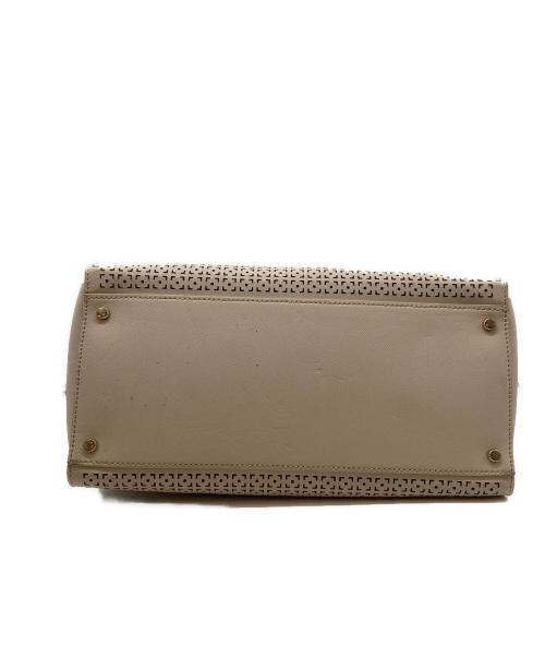 Kate Spade（ケイトスペード）Kate Spade (ケイトスペード) cameron street perforated candace ベージュの古着・服飾アイテム