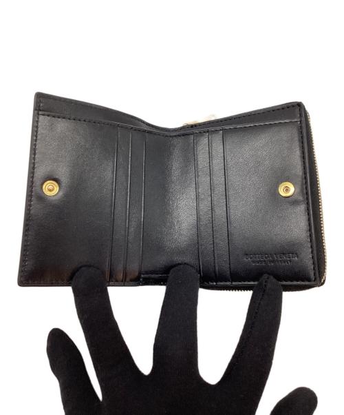 BOTTEGA VENETA（ボッテガベネタ）BOTTEGA VENETA (ボッテガベネタ) 2つ折り財布 ブラックの古着・服飾アイテム