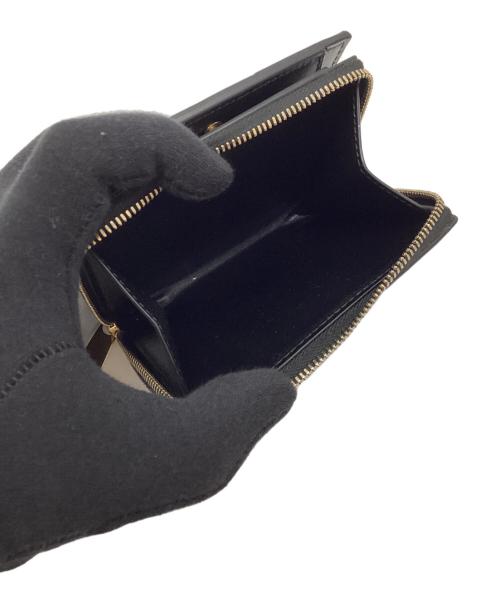 BOTTEGA VENETA（ボッテガベネタ）BOTTEGA VENETA (ボッテガベネタ) 2つ折り財布 ブラックの古着・服飾アイテム