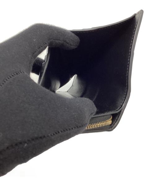 BOTTEGA VENETA（ボッテガベネタ）BOTTEGA VENETA (ボッテガベネタ) 2つ折り財布 ブラックの古着・服飾アイテム