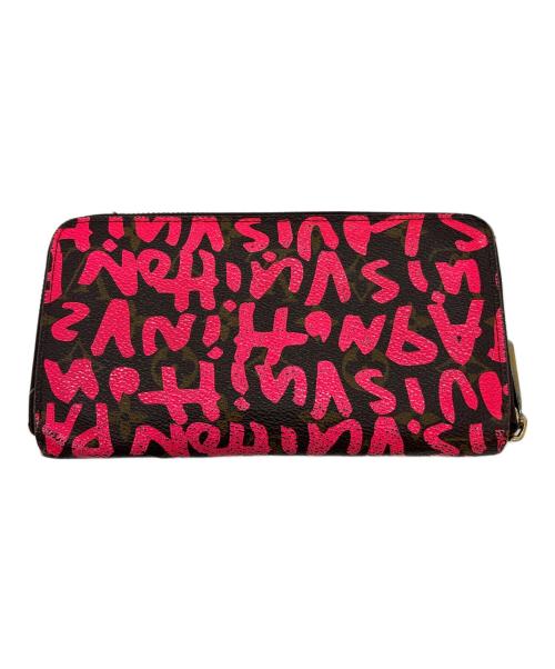 LOUIS VUITTON（ルイ ヴィトン）LOUIS VUITTON (ルイ ヴィトン) ラウンドファスナー財布/モノグラム・グラフティ・ジッピー ウォレット ショッキングピンク・ブラウンの古着・服飾アイテム