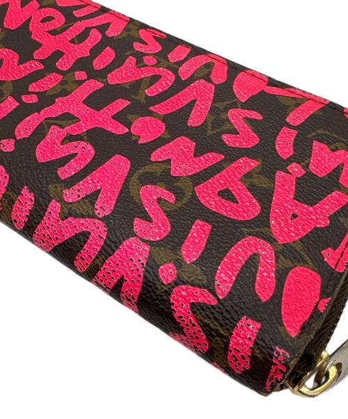 LOUIS VUITTON（ルイ ヴィトン）LOUIS VUITTON (ルイ ヴィトン) ラウンドファスナー財布/モノグラム・グラフティ・ジッピー ウォレット ショッキングピンク・ブラウンの古着・服飾アイテム