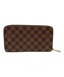 LOUIS VUITTON（ルイ ヴィトン）の古着「ラウンドファスナー財布」｜ブラウン