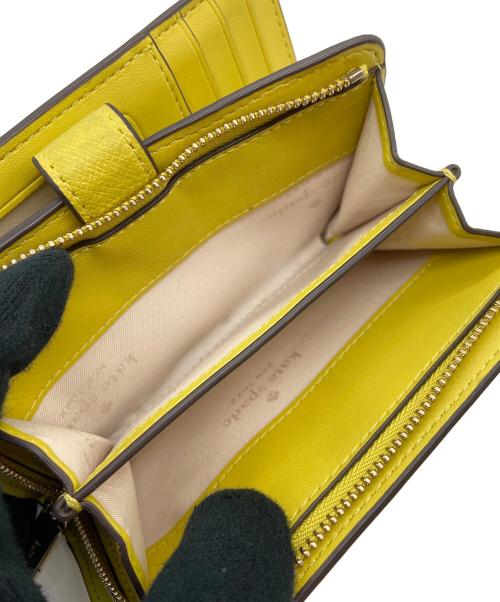 Kate Spade（ケイトスペード）Kate Spade (ケイトスペード) 2つ折り財布 イエローの古着・服飾アイテム