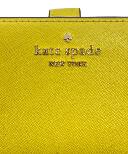 Kate Spade（ケイトスペード）Kate Spade (ケイトスペード) 2つ折り財布 イエローの古着・服飾アイテム