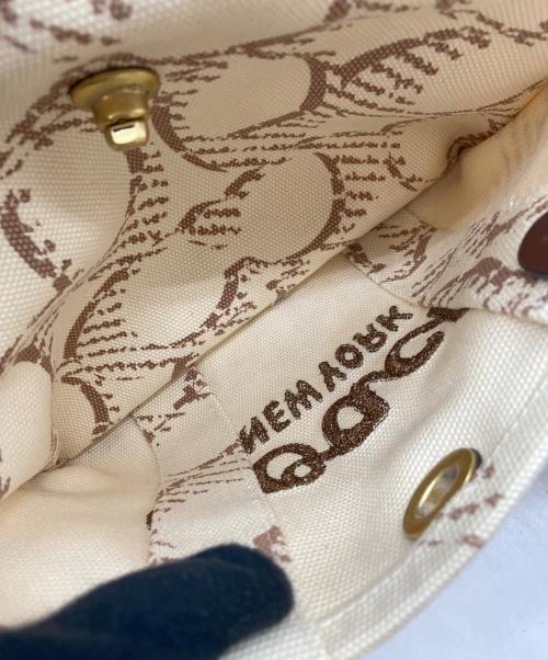 COACH（コーチ）COACH (コーチ) ハンドバッグ/シグネチャー/カーゴトート/キャンバス ベージュ×ぶらうｎの古着・服飾アイテム