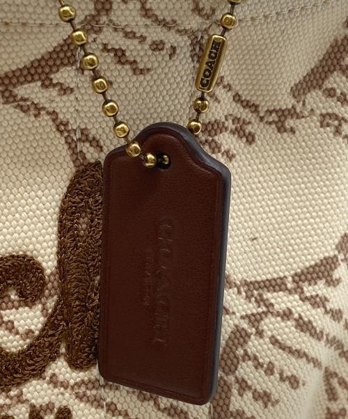 COACH（コーチ）COACH (コーチ) ハンドバッグ/シグネチャー/カーゴトート/キャンバス ベージュ×ぶらうｎの古着・服飾アイテム