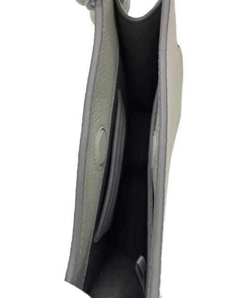 MCM（エムシーエム）MCM (エムシーエム) ショルダーレザーポーチ グレーの古着・服飾アイテム