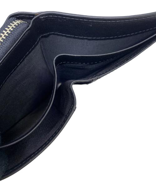 Jean Paul GAULTIER（ジャンポールゴルチェ）Jean Paul GAULTIER (ジャンポールゴルチェ) ドラゴン2つ折り財布 ブラックの古着・服飾アイテム