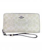COACHコーチ）の古着「COACH　シグネチャー　ベージュ　ラウンドファスナー長財布」｜ベージュ