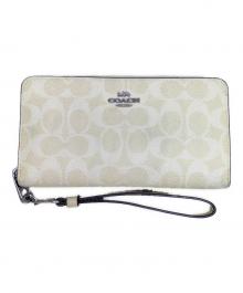 COACH（コーチ）の古着「COACH　シグネチャー　ベージュ　ラウンドファスナー長財布」｜ベージュ