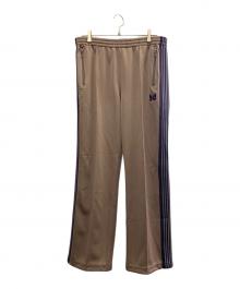 Needles（ニードルズ）の古着「トラックパンツ」｜ベージュ×パープル