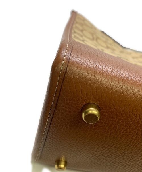 COACH（コーチ）COACH (コーチ) DISNEY (ディズニー) COACH×Disney　シグネチャー　デンプシーキャリーオール　2WAYバッグ ベージュ×ブラウンの古着・服飾アイテム