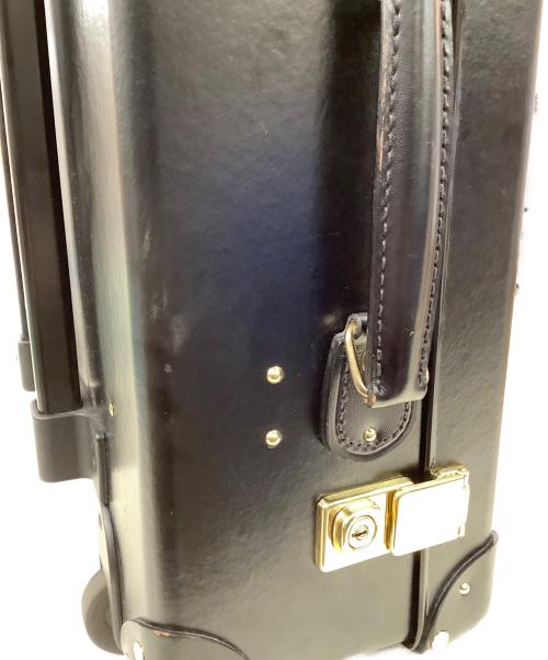 GLOBE-TROTTER（グローブトロッター）GLOBE-TROTTER (グローブトロッター) GLOBE-TROTTER　キャリーバッグ ブラック×ゴールドの古着・服飾アイテム