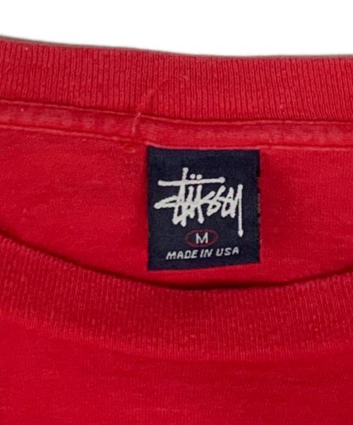 stussy（ステューシー）stussy (ステューシー) stussy　レッド　internatrional 2000　半袖カットソー レッド サイズ:SIZE Mの古着・服飾アイテム