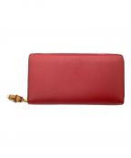 GUCCIグッチ）の古着「ラウンドファスナー財布」｜レッド