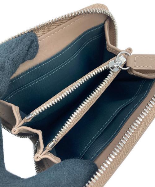 LACOSTE（ラコステ）LACOSTE (ラコステ) スモールジップウォレット ベージュの古着・服飾アイテム