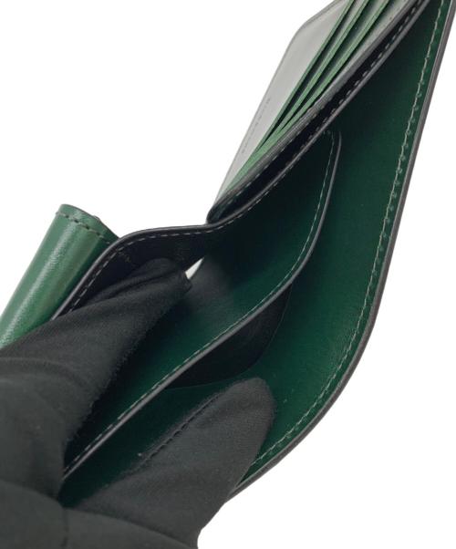 WILDSWANS（ワイルドスワンズ）WILDSWANS (ワイルドスワンズ) 2つ折り財布 グリーンの古着・服飾アイテム