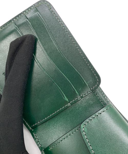 WILDSWANS（ワイルドスワンズ）WILDSWANS (ワイルドスワンズ) 2つ折り財布 グリーンの古着・服飾アイテム