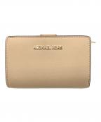 MICHAEL KORSマイケル・コース）の古着「2つ折り財布」｜ベージュ