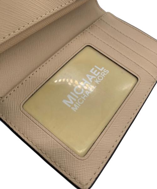 MICHAEL KORS（マイケル・コース）MICHAEL KORS (マイケルコース) 2つ折り財布 ベージュの古着・服飾アイテム