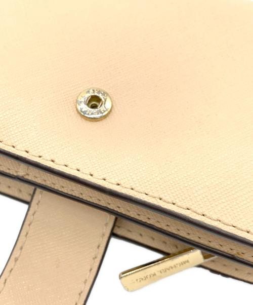 MICHAEL KORS（マイケル・コース）MICHAEL KORS (マイケルコース) 2つ折り財布 ベージュの古着・服飾アイテム