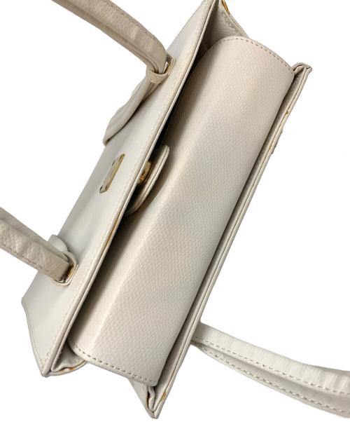 MCM（エムシーエム）MCM (エムシーエム) ハンドバッグ ベージュの古着・服飾アイテム