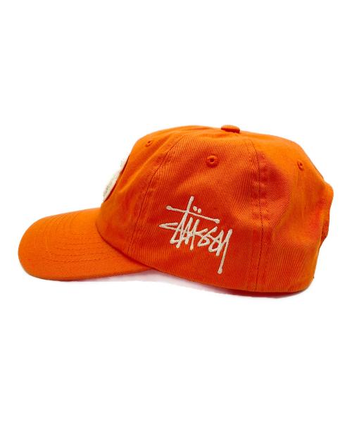 stussy（ステューシー）stussy (ステューシー) キャップ オレンジの古着・服飾アイテム